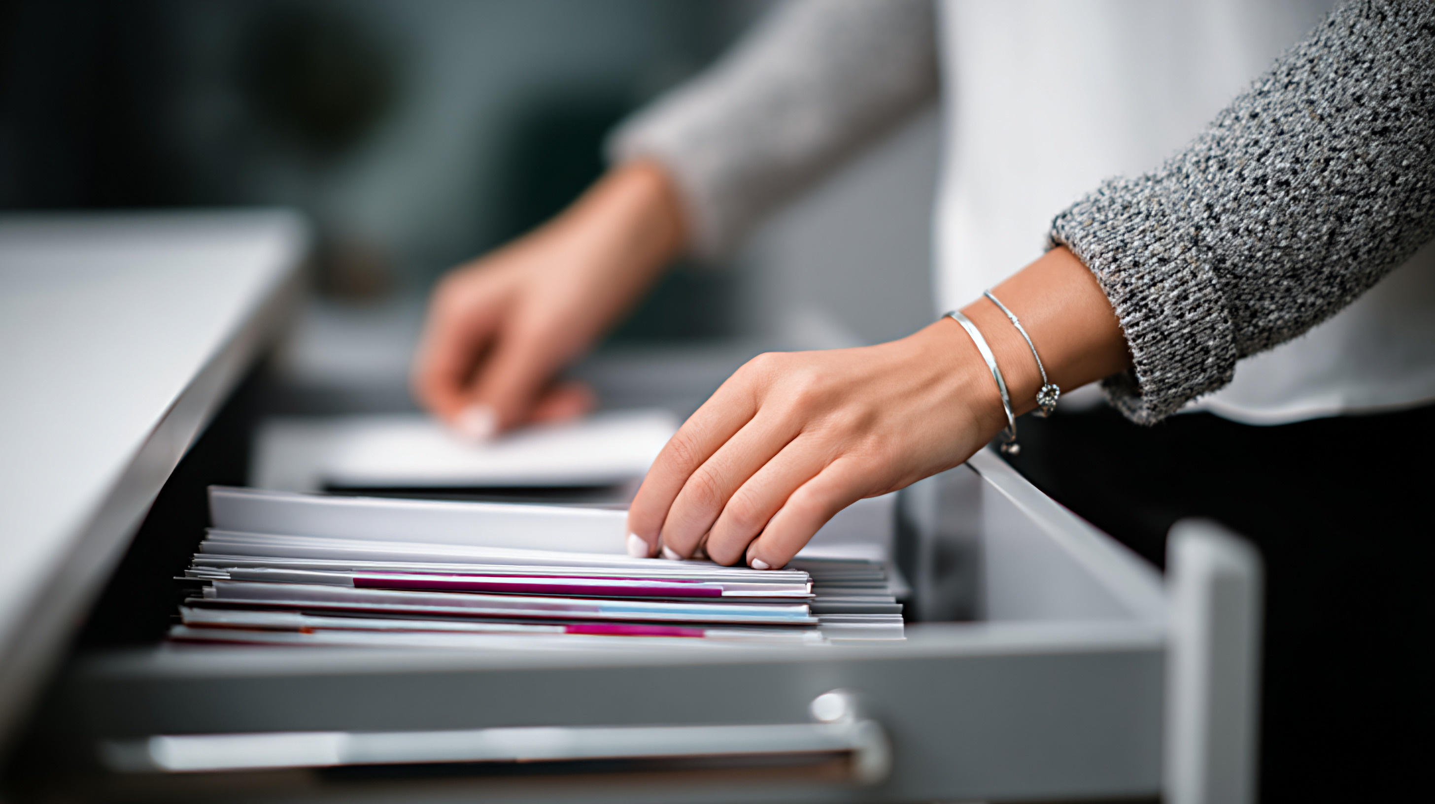 Administrative support workspace with calendar and organized business materials
