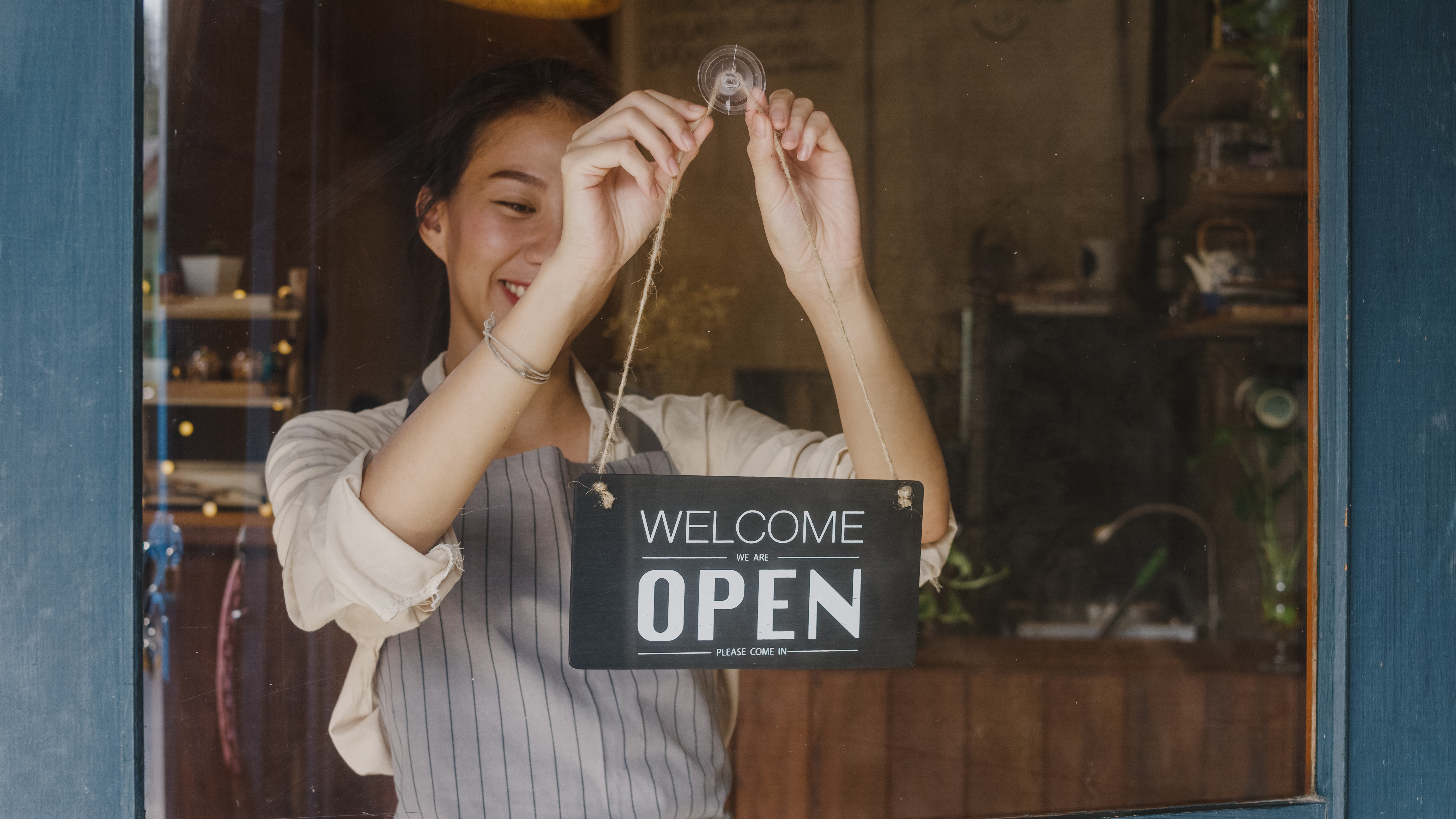 Small business owner opening for the day
